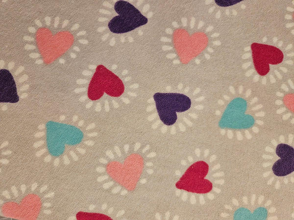 Hearts. Hearts. Hearts. Gray background. Flannel and terry cloth