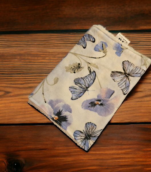 Purple butterfly and flowers. Flannel and terry cloth