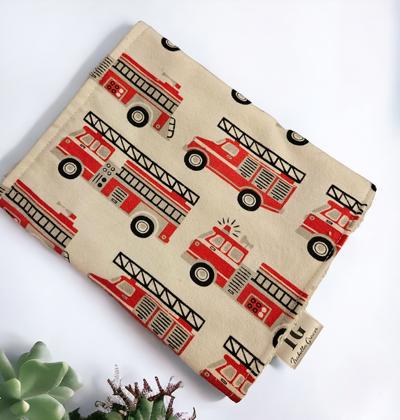 Firetrucks on white background. Flannel and terry cloth