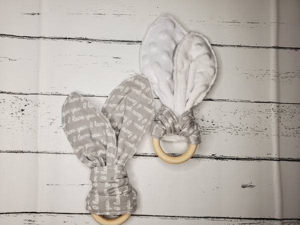 Burp cloth with wooden bunny ears teether